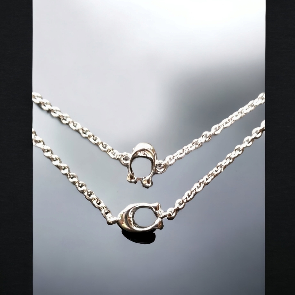 NWT Authentic COACH Signature Long Silvertone Necklace